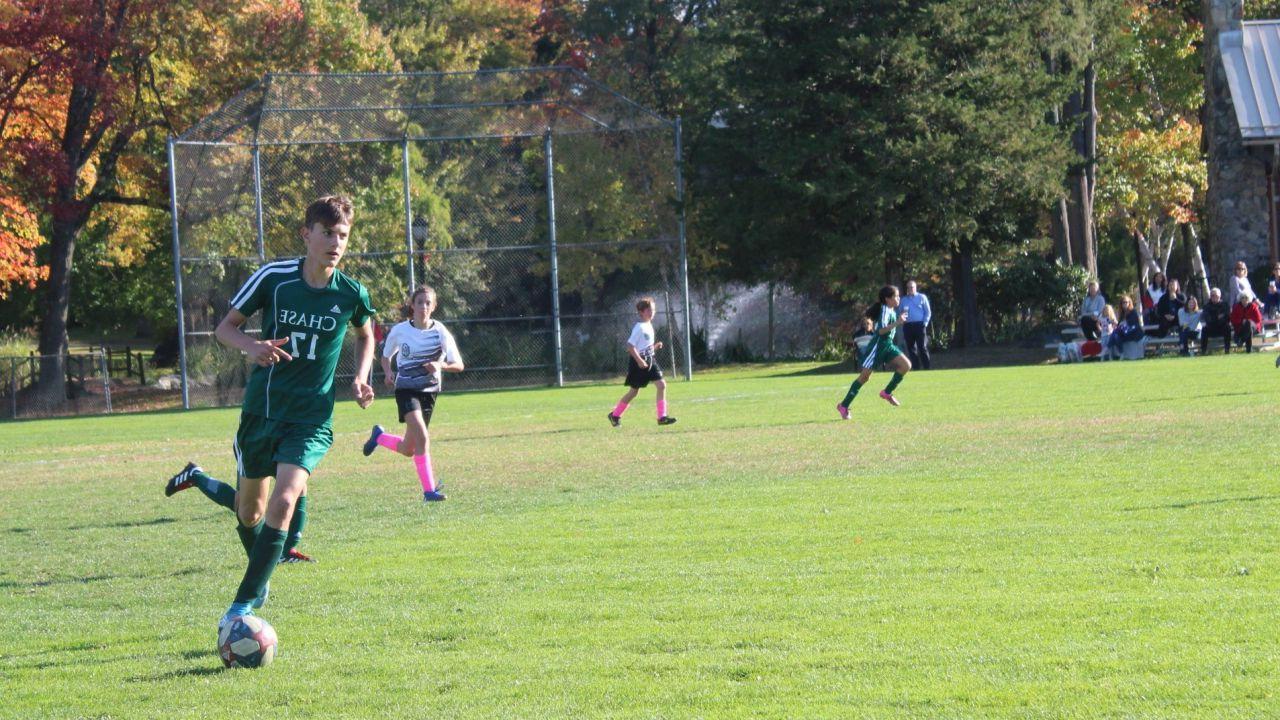 Nick Ciampi Chase Collegiate Dribbles in Middle School Soccer.jpg